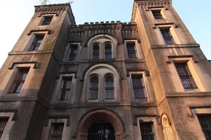 Front facade of the Old Charleston Jail building shown during the day.